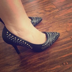 Black studded pumps